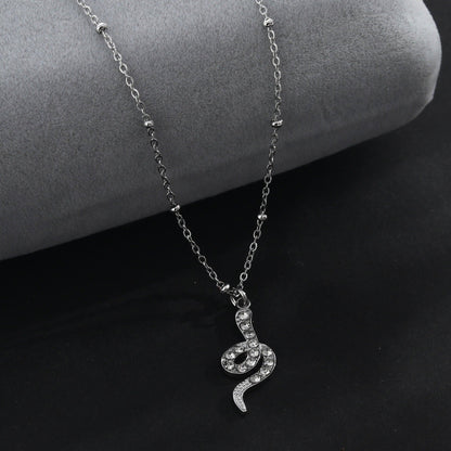 RIHANNA Collier chaîne perlée avec pendentif serpent pavé en zircone en argent