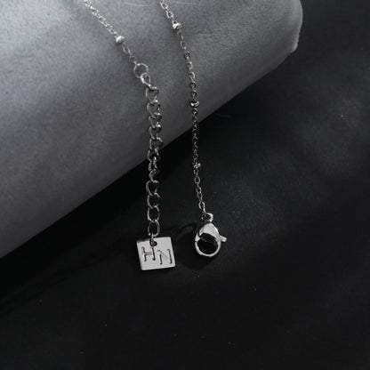 RIHANNA Collier chaîne perlée avec pendentif serpent pavé en zircone en argent