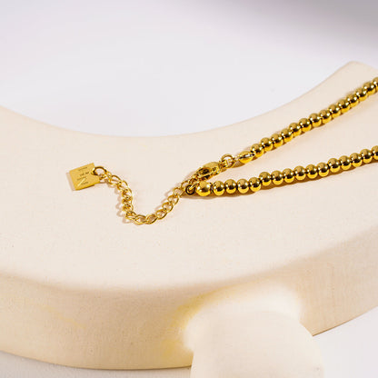 RIKKO : Collier contemporain à perles-boules