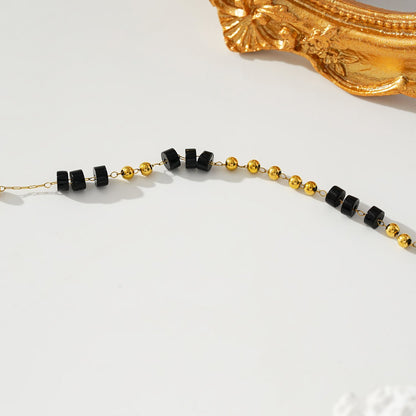 ROSARIO LG: Bracelet de cheville à chaîne de perles en onyx noir et or