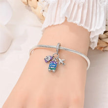Breloque de voyage en argent sterling L'aventure vous attend