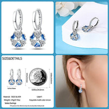 Boucles d'oreilles créoles en argent sterling avec breloque fleur bleue élégante