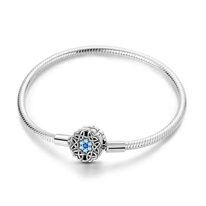 Bracelet en argent sterling flocon de neige celtique avec zircone cubique bleue