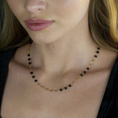 SANTA CRUZ Noir : Collier ras du cou en perles d'onyx noir et or