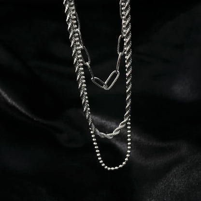 SELENE : Collier triple couche en chaîne mélangée en or blanc rhodié