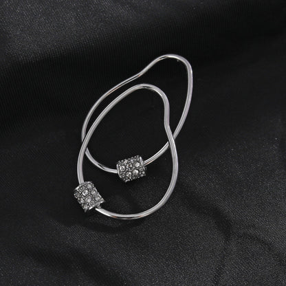 SIMAN Irregular Shaped Pavé Zirconia accented Hoop Earrings in Silver