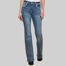 Jean bootcut taille haute pour femme avec broderies tête de mort et rose ornées de strass, Skull Rider.