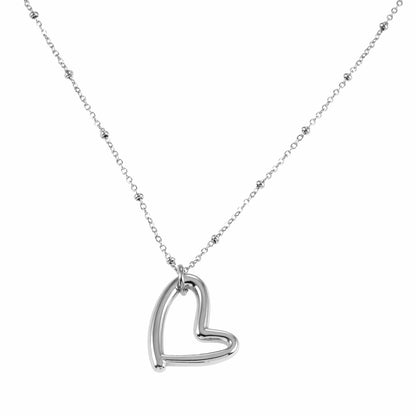 SMITTEN Argent (Or Blanc) : Une chaîne perlée délicate retenant un pendentif abstrait en forme de cœur