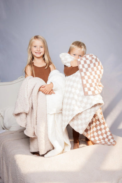 Couverture pour tout-petit à carreaux blancs et couleur chocolat