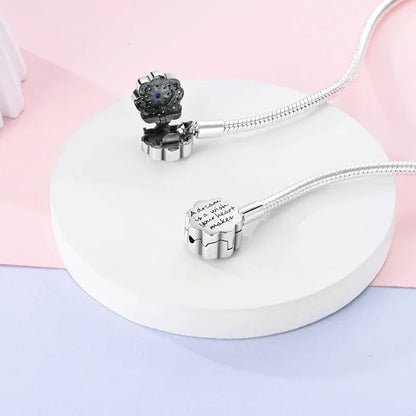 Bracelet en argent sterling avec fermoir fleur bleue et gravure « Dream »
