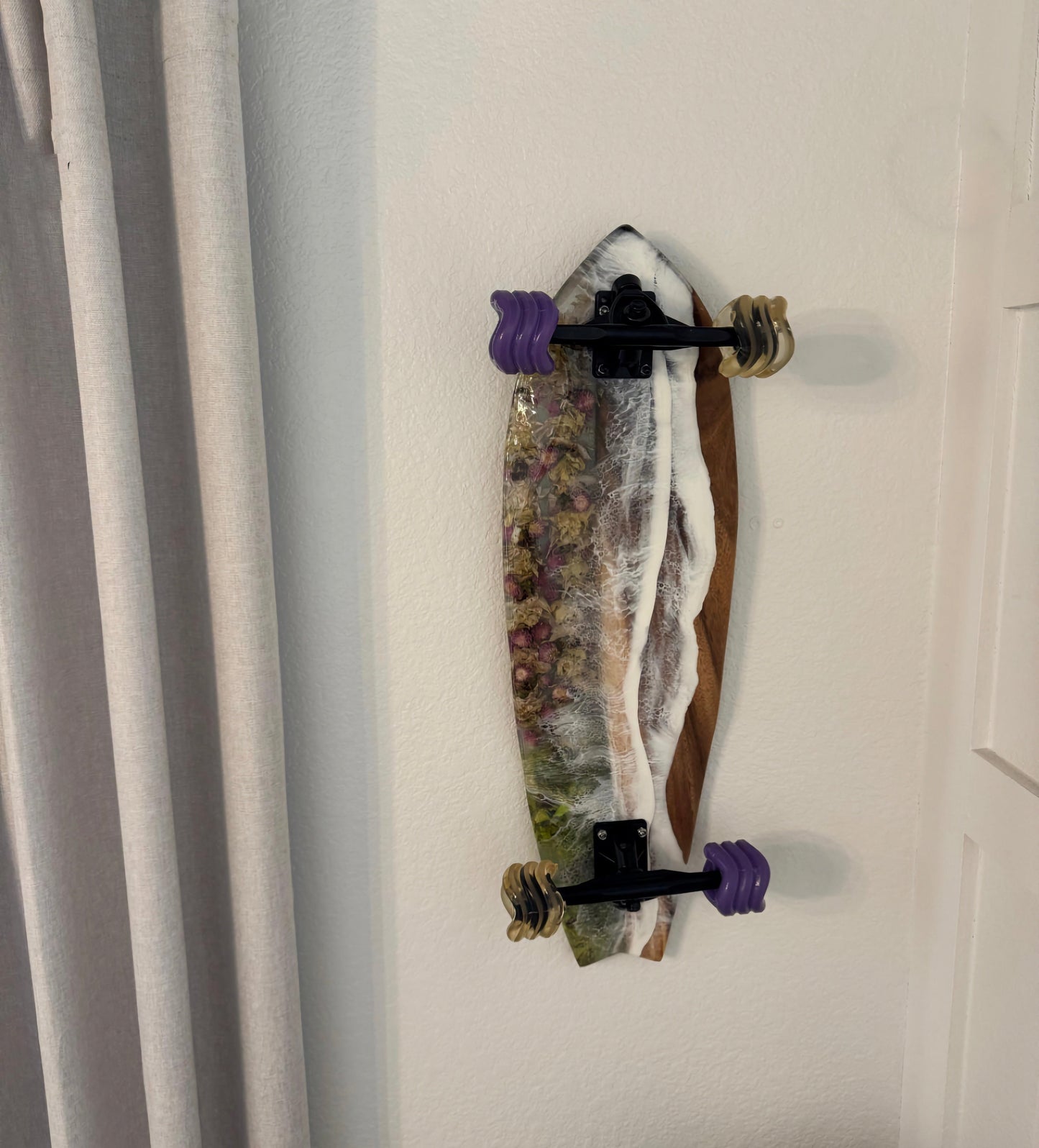 Support mural pour planche de skateboard