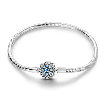 Bracelet en argent sterling avec fermoir fleur bleue et gravure « Dream »