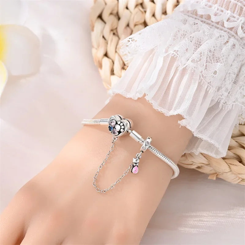 Bracelet à breloques en argent sterling cœur et patte avec chaîne de sécurité