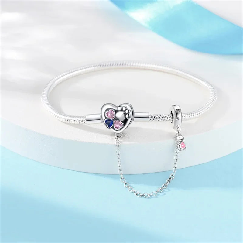 Bracelet à breloques en argent sterling cœur et patte avec chaîne de sécurité