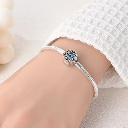 Bracelet en argent sterling flocon de neige celtique avec zircone cubique bleue