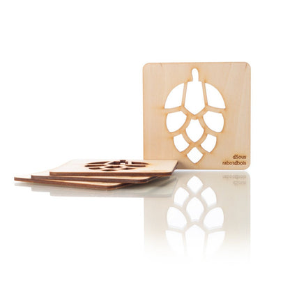 Wooden coasters with openwork designs