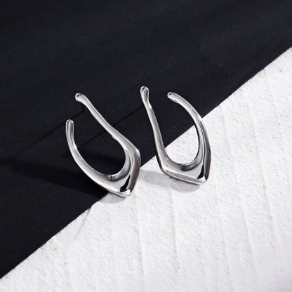 Boucles d'oreilles créoles forme abstraite TARAJI en argent