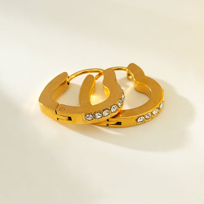 Style TENDER Gold : Mini créoles cœur pavées de zirconiums