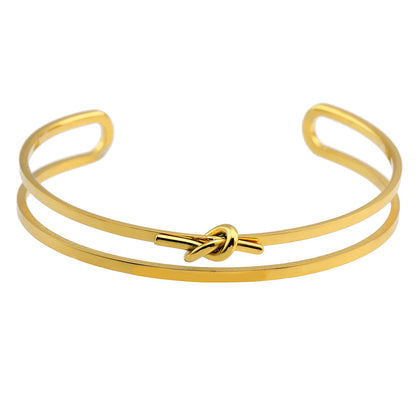 LIÉ : Bracelet empilé détaillé avec nœud, couleur or