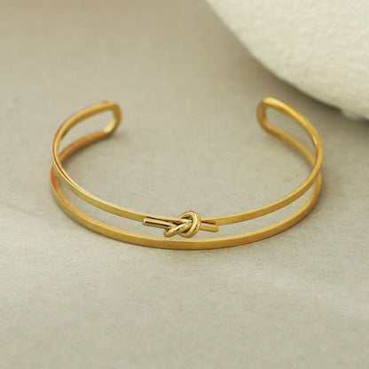 LIÉ : Bracelet empilé détaillé avec nœud, couleur or