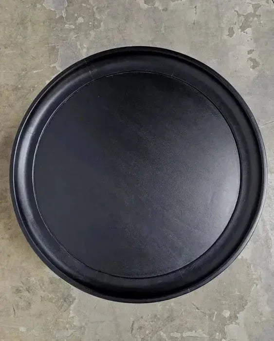 Round coffee table in black-finished mango wood