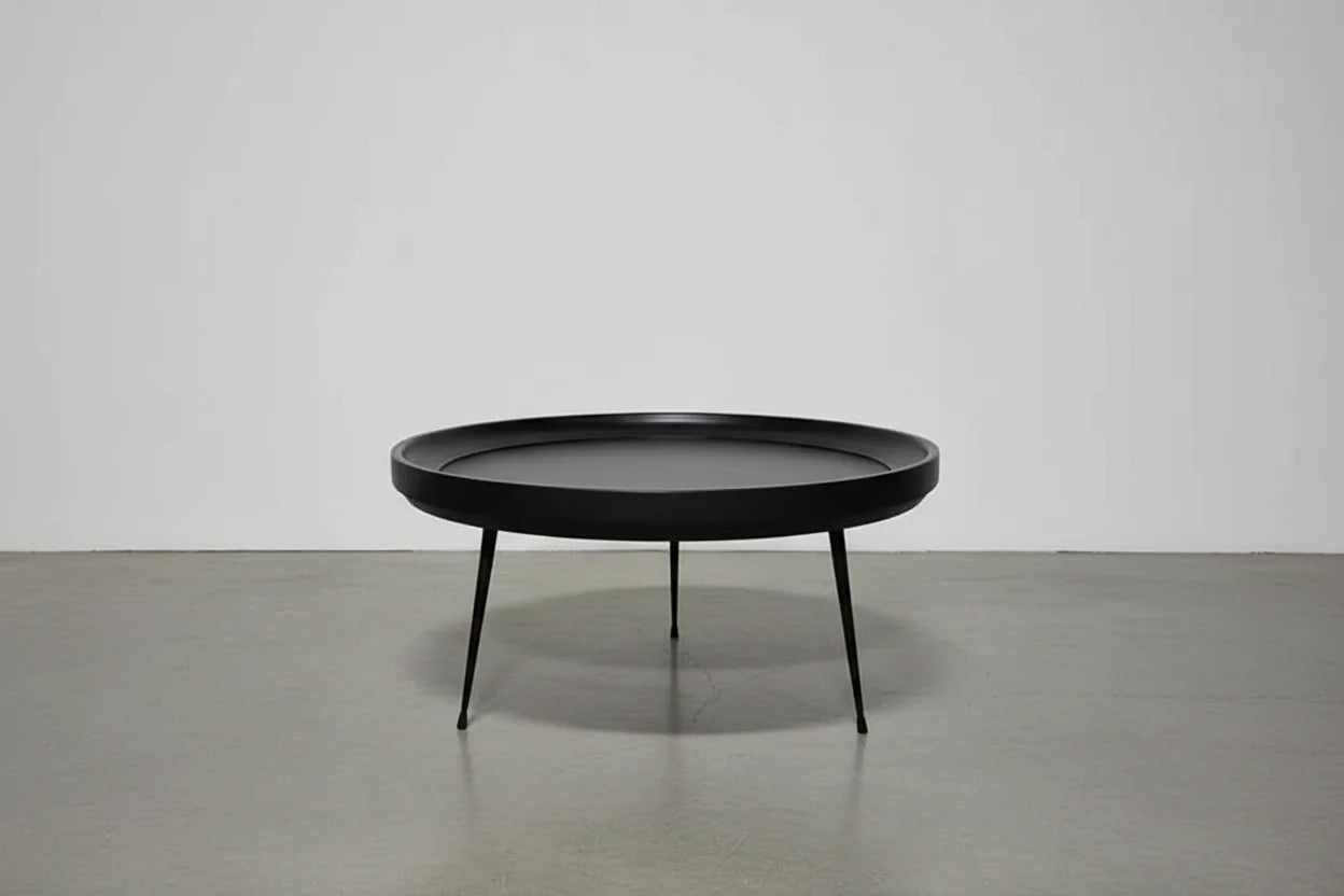 Round coffee table in black-finished mango wood