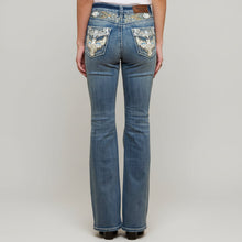 Jean bootcut brodé pour femme Westfield Eagle. Jean taille haute à ornements Eagle.