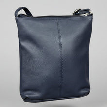 Sac bandoulière fin en cuir. Petit sac vertical zippé pour femme avec bandoulière réglable