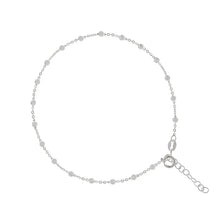 Cheville en perles argentées