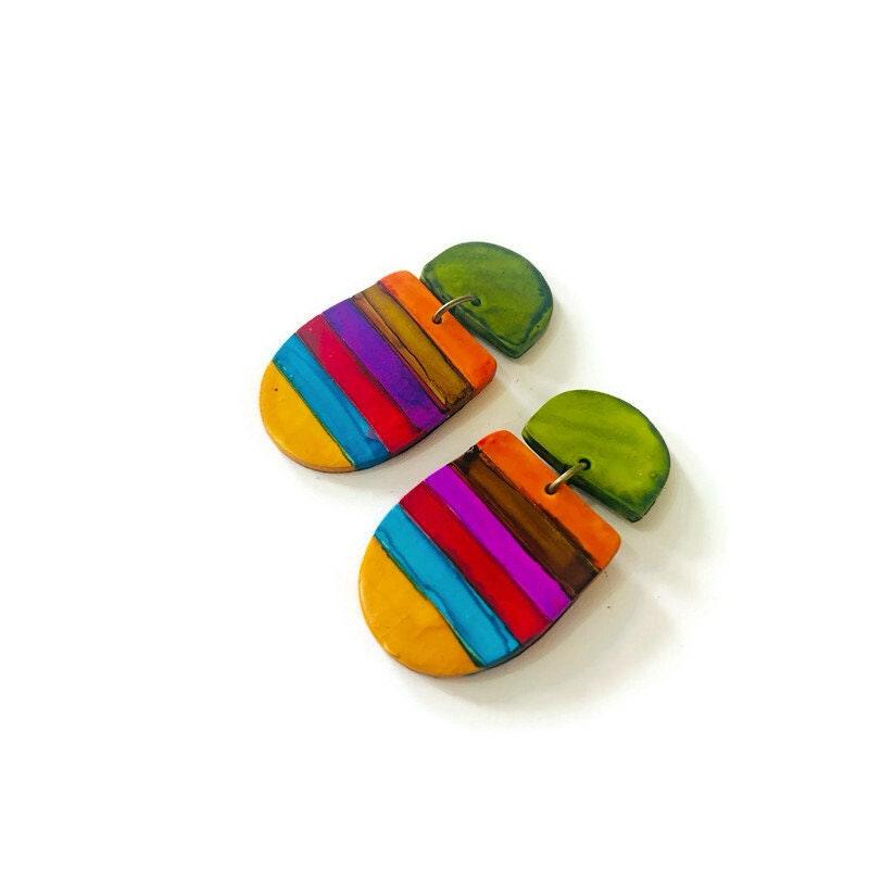 Boucles d'oreilles clip colorées à rayures