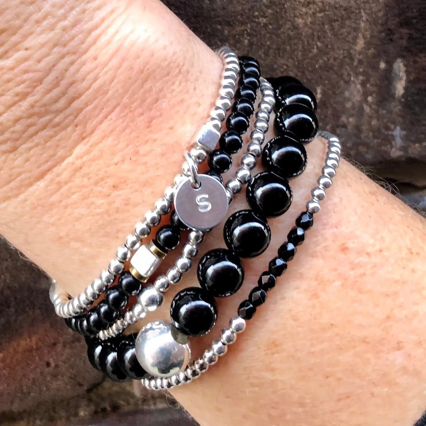 Pile de bracelets initiaux Guerrier