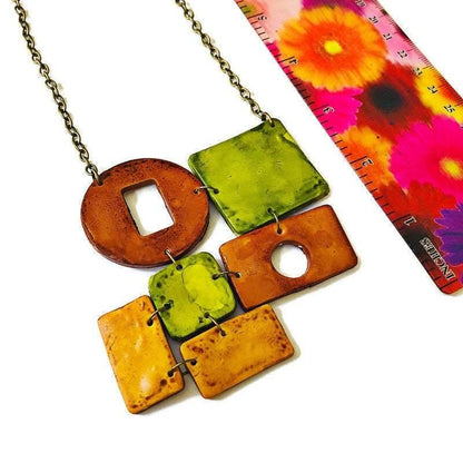 Parure de bijoux d'automne avec collier audacieux et épais et longues boucles d'oreilles géométriques