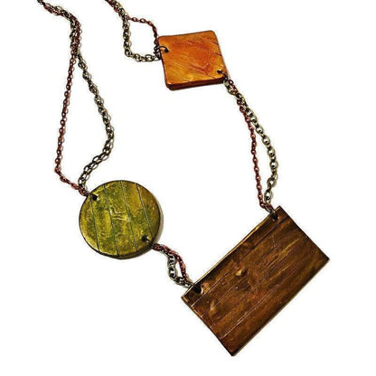 Collier plastron géométrique avec double chaîne en bronze et cuivre