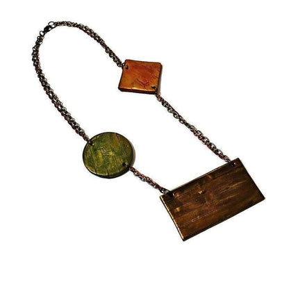 Collier plastron géométrique avec double chaîne en bronze et cuivre