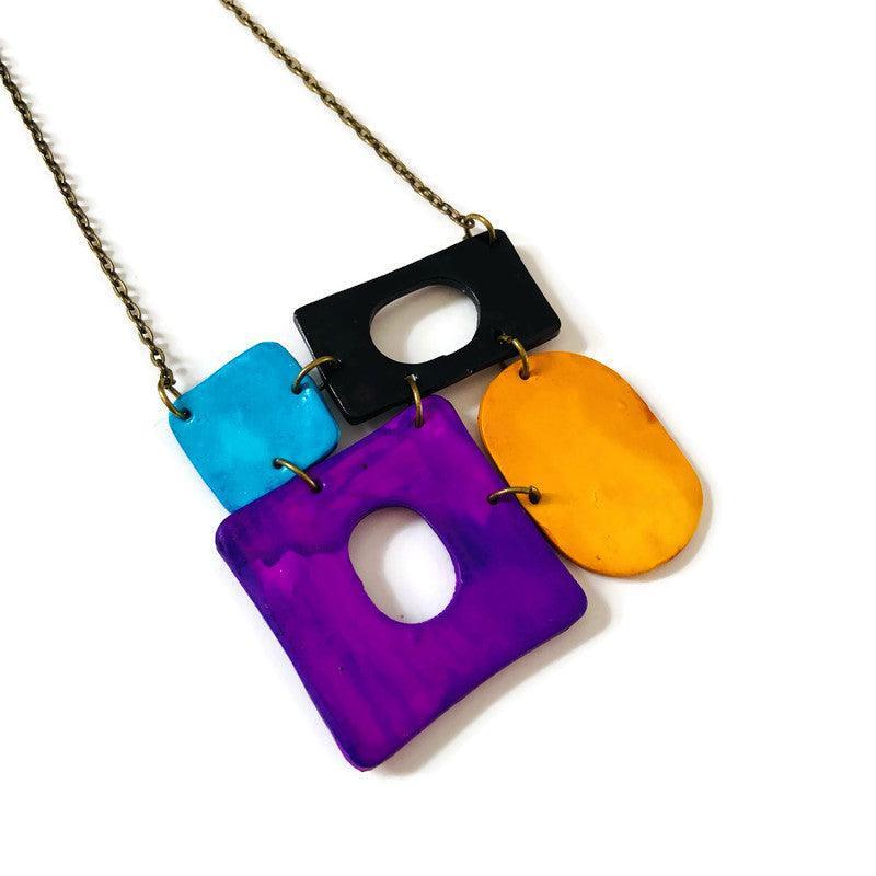 Collier pendentif audacieux Color Block, design quatre pièces, fait main en pâte polymère