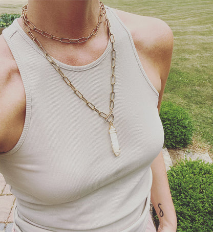 Collier double tour en quartz clair et trombones, doré