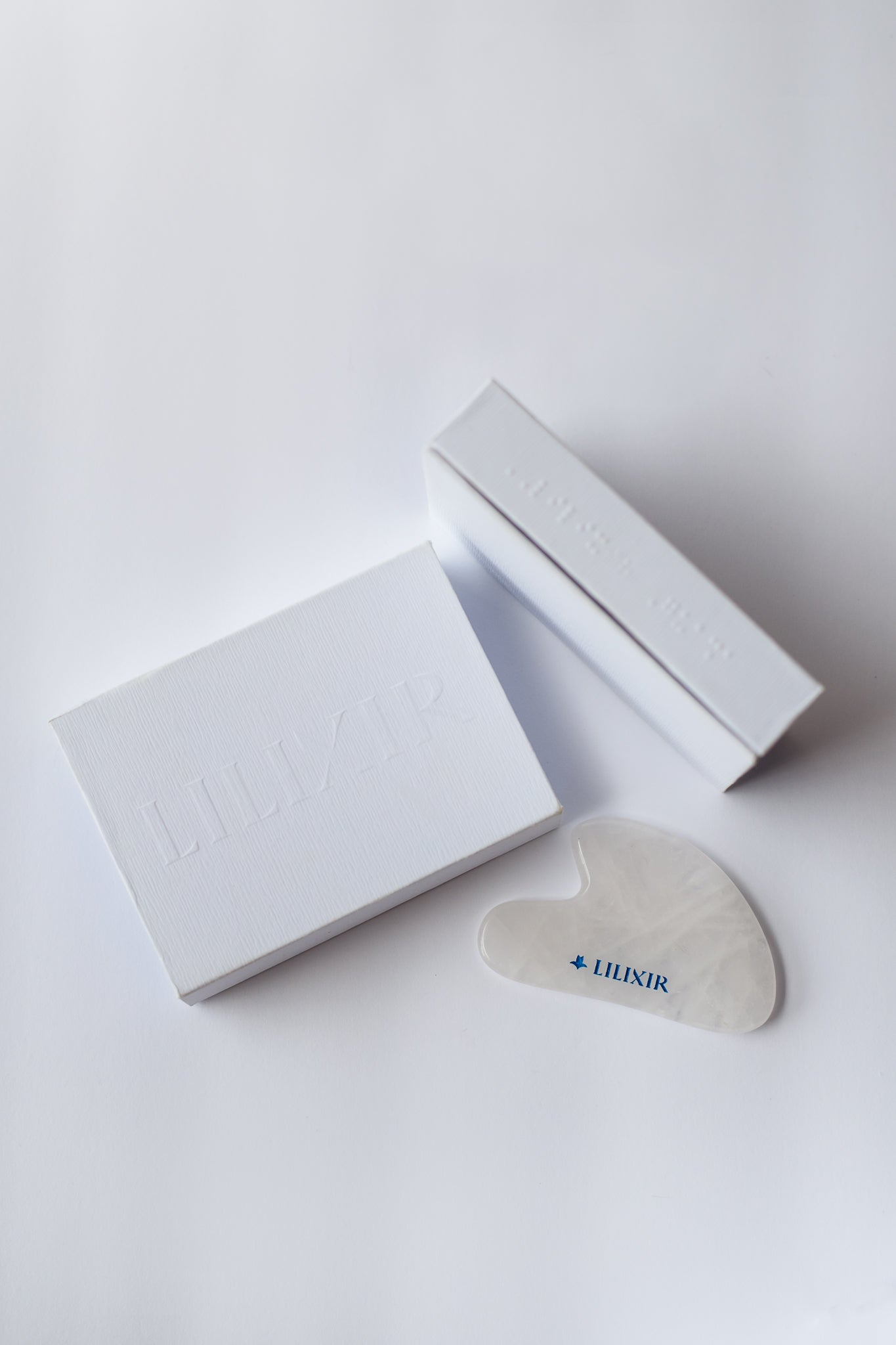Outil d'acupression Gua Sha en cristal blanc