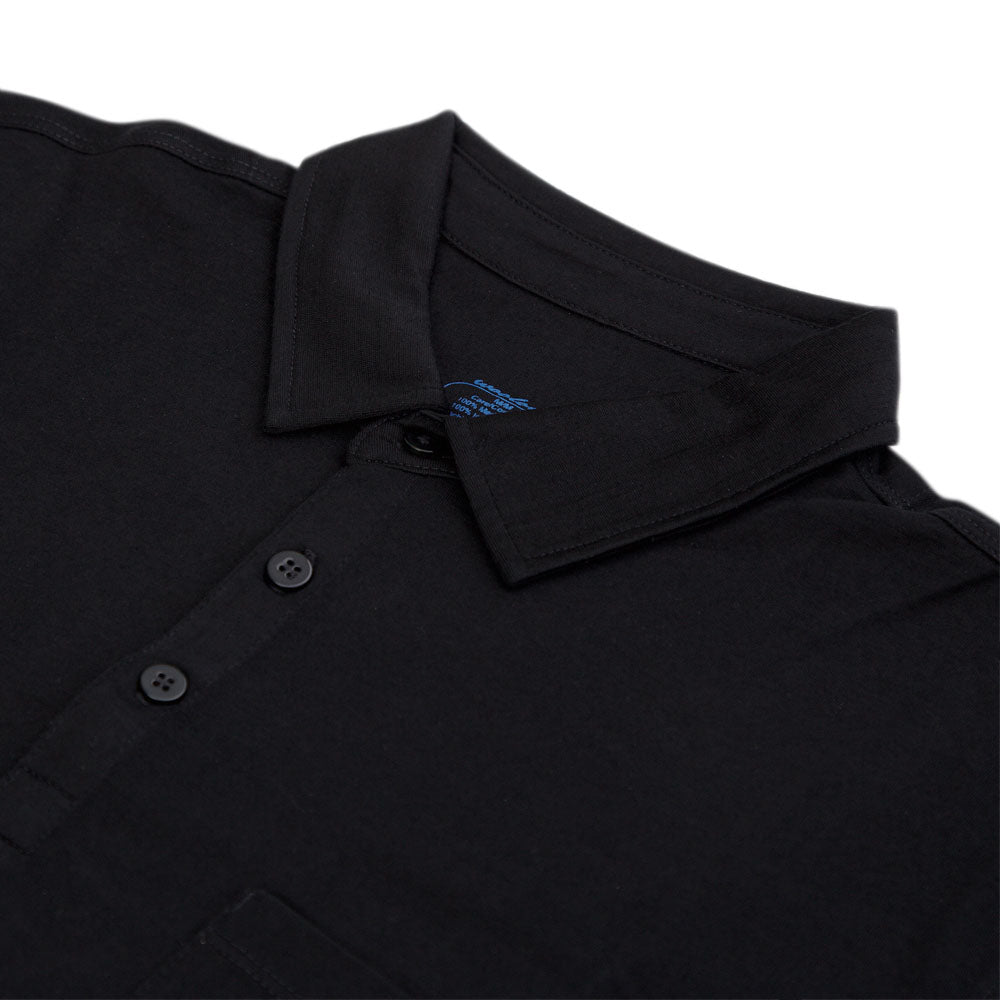 Polo de golf léger en laine mérinos pour homme