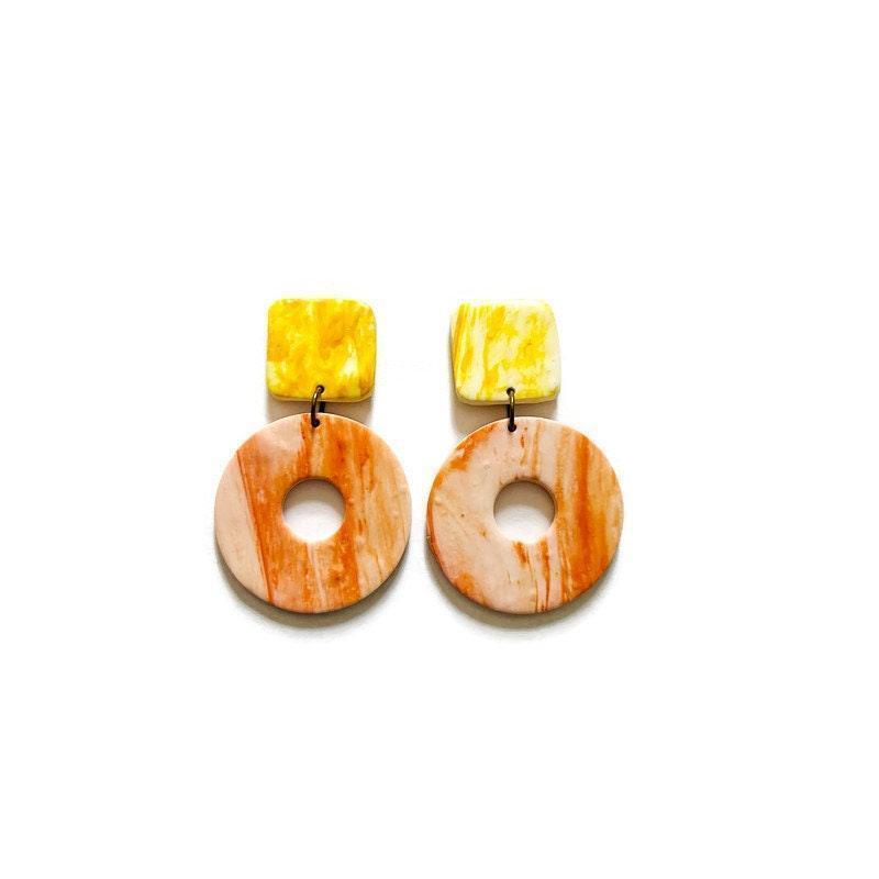 Boucles d'oreilles clips pastel faites à la main en argile