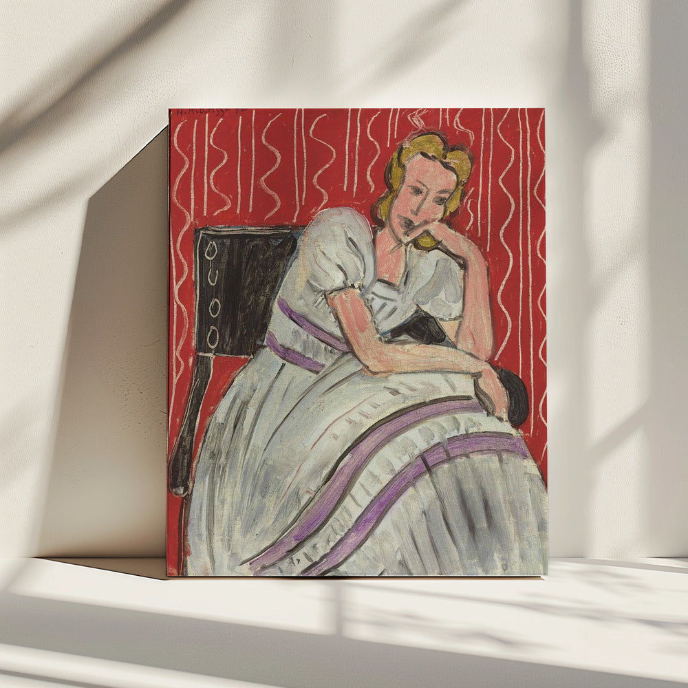Tableau mural Jeune femme assise en robe grise