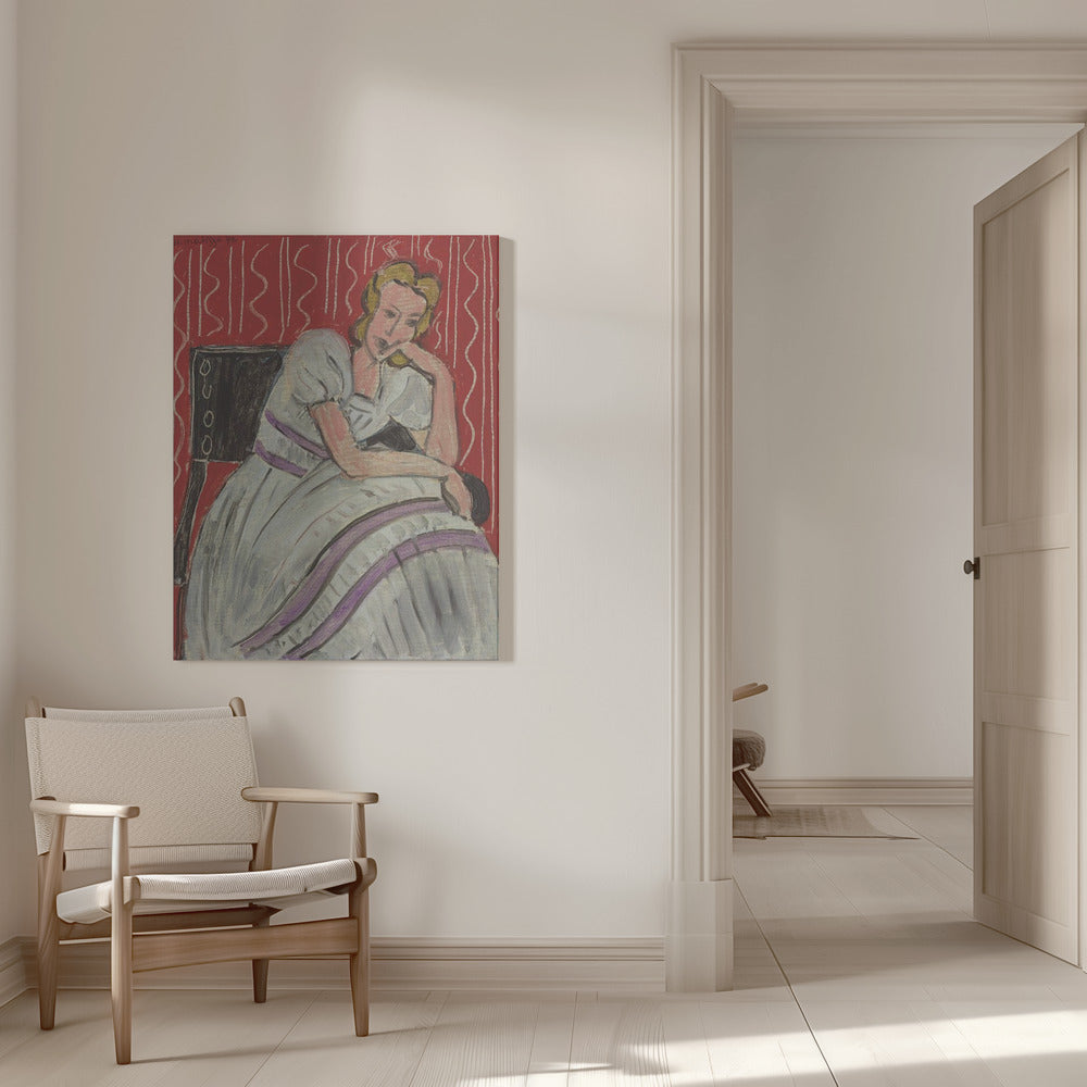 Tableau mural Jeune femme assise en robe grise