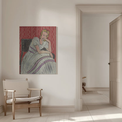 Tableau mural Jeune femme assise en robe grise